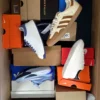 The photo shows a package with footwear in the category CS.