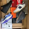 The photo shows a package with footwear in the category CS.