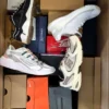 The photo shows a package with footwear in the category CS.