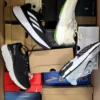 The photo shows a package with footwear in the category CS.