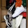 The photo shows a package with footwear in the category CS.