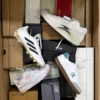 The photo shows a package with footwear in the category CS.