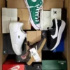 The photo shows a package with footwear in the category CS.