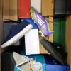 The photo shows a package with footwear in the category CS.