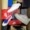 The photo shows a package with footwear in the category CS.