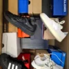The photo shows a package with footwear in the category CS.