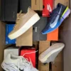 The photo shows a package with footwear in the category CS.