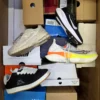 The photo shows a package with footwear in the category CS.