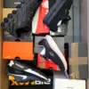 The photo shows a package with footwear in the category CS.