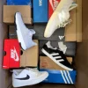 The photo shows a package with footwear in the category CS.