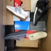 The photo shows a package with footwear in the category CS.
