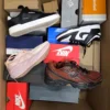 The photo shows a package with footwear in the category CS.