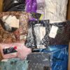 The photo shows a package with clothing in the category AW.