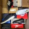 The photo shows a package with footwear in the category CS.