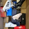 The photo shows a package with footwear in the category CS.