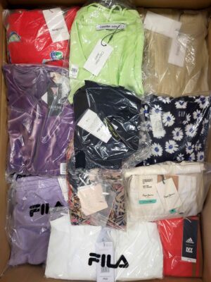 The photo shows a package with clothing in the category AW.