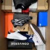 The photo shows a package with footwear in the category CS.