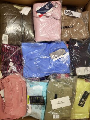 The photo shows a package with clothing in the category AW.