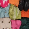 The photo shows a package with clothing in the category SN.