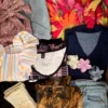 The photo shows a package with clothing in the category SN.