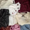 The photo shows a package with clothing in the category SN.
