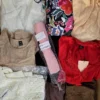 The photo shows a package with clothing in the category SN.