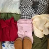The photo shows a package with clothing in the category SN.