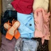The photo shows a package with clothing in the category SN.
