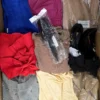 The photo shows a package with clothing in the category SN.