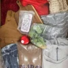 The photo shows a package with clothing in the category SN.