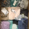 The photo shows a package with clothing in the category AP.