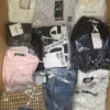 The photo shows a package with clothing in the category AP.