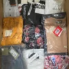 The photo shows a package with clothing in the category AP.