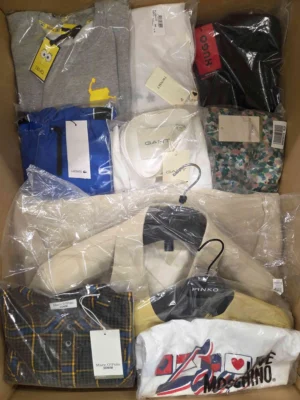 The photo shows a package with clothing in the category AP.