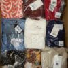 The photo shows a package with clothing in the category YA.