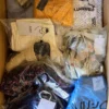 The photo shows a package with clothing in the category A.