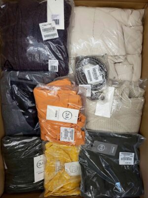 The photo shows a package with clothing in the category YA.