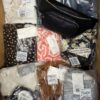 The photo shows a package with clothing in the category YA.