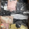 The photo shows a package with clothing in the category A.