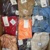 The photo shows a package with clothing in the category YA.