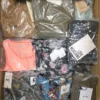 The photo shows a package with clothing in the category A.
