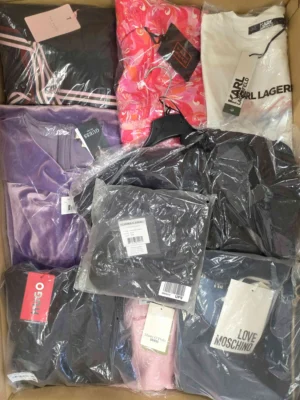 The photo shows a package with clothing in the category A.