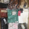 The photo shows a package with clothing in the category A.