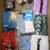 H1062 1 The photo shows a package with clothing in the category H.