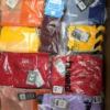 The photo shows a package with clothing in the category H.