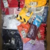 The photo shows a package with clothing in the category H.
