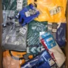 The photo shows a package with clothing in the category H.