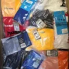 The photo shows a package with clothing in the category H.