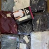 The photo shows a package with clothing in the category T.