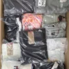 OT115 1 The photo shows a package with clothing in the category T.